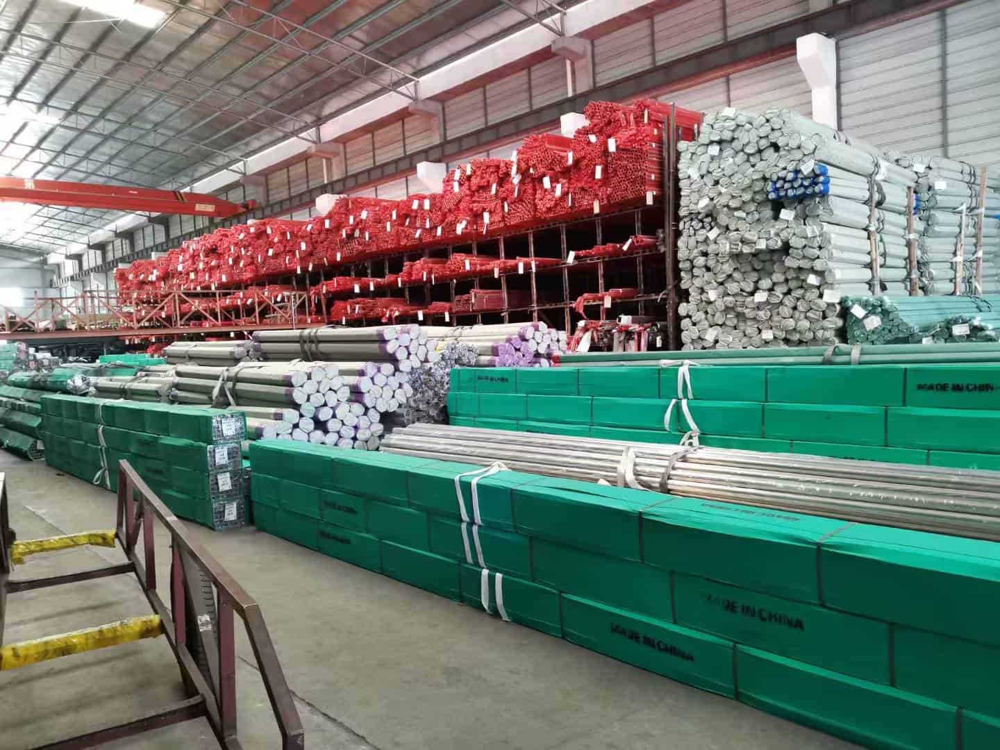 Packaged stainless steel tubes and pipe bundles organized for storage and shipment