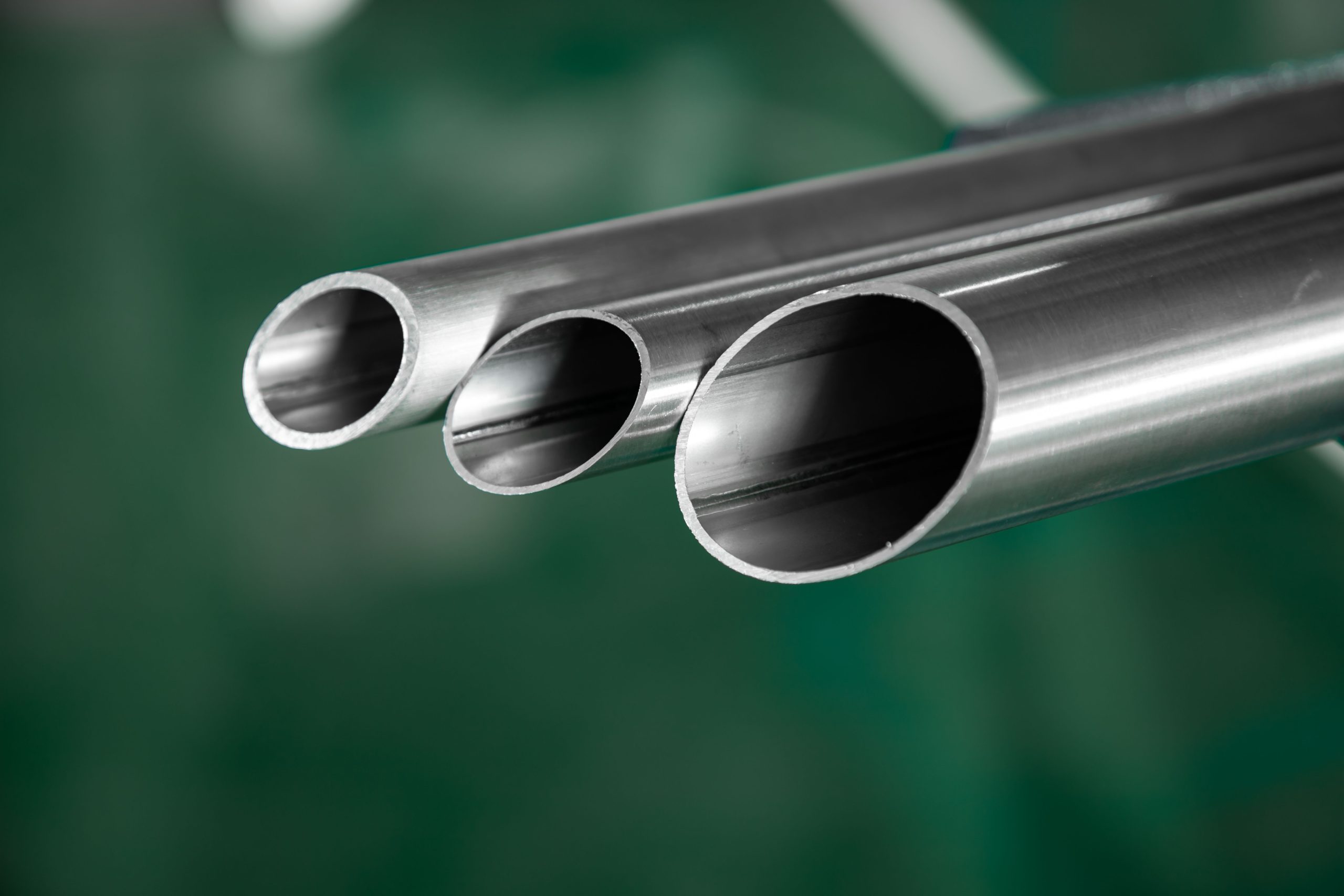 Stainless steel welded pipe prepared for dimensional and surface inspection