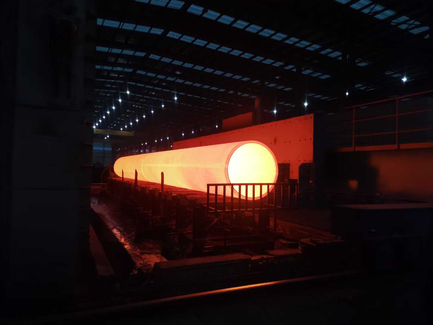 Hot-pierced tube shell exiting the piercing mill