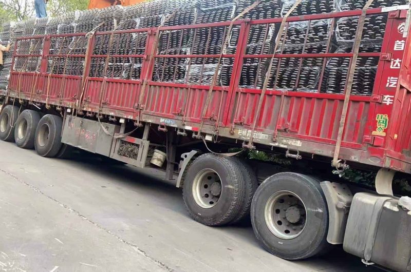pipe crate loaded onto truck