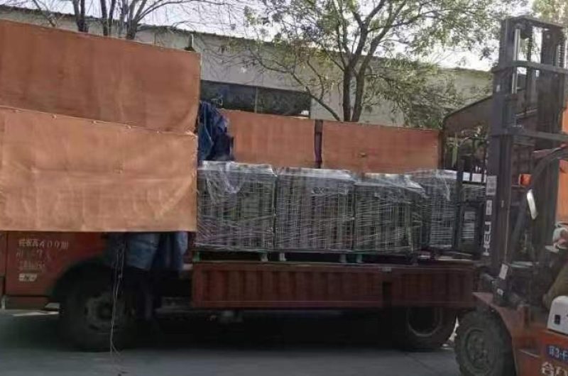 SS pipes being lifted by forklift