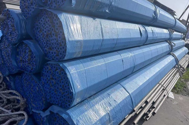 stainless steel pipes in wooden frame